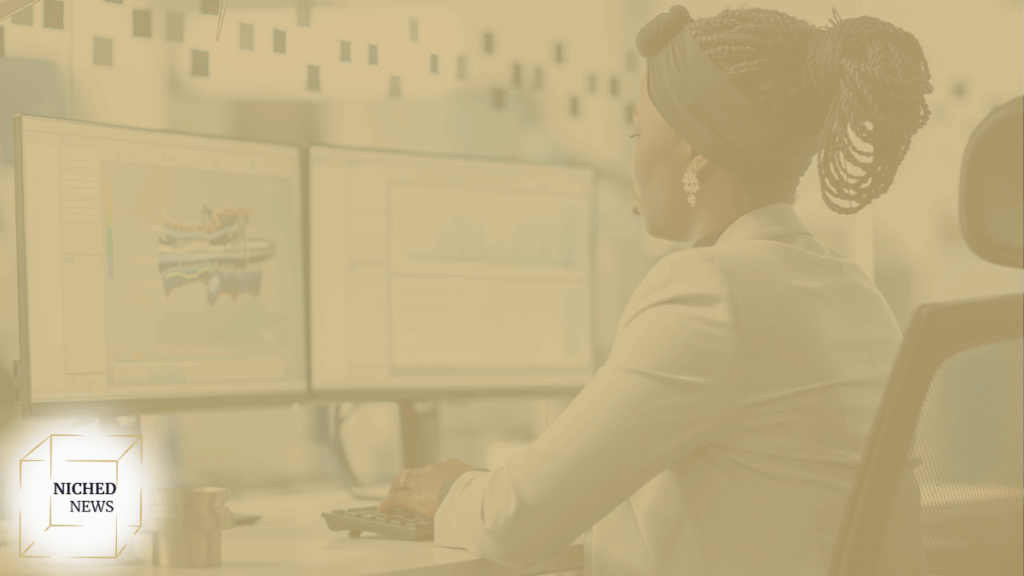 Woman engineer working with CAD software on dual monitors